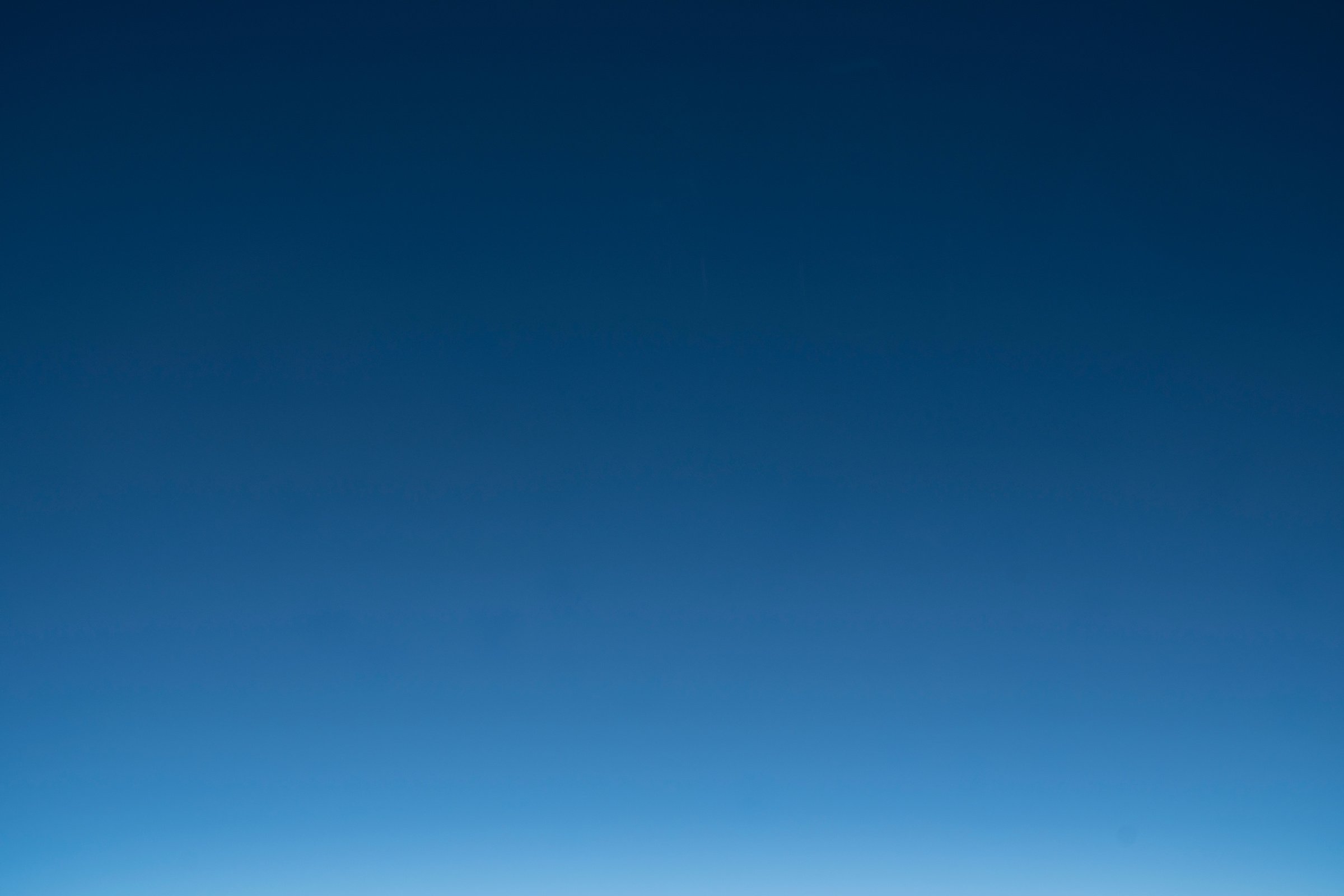 Dark blue sky background gradient